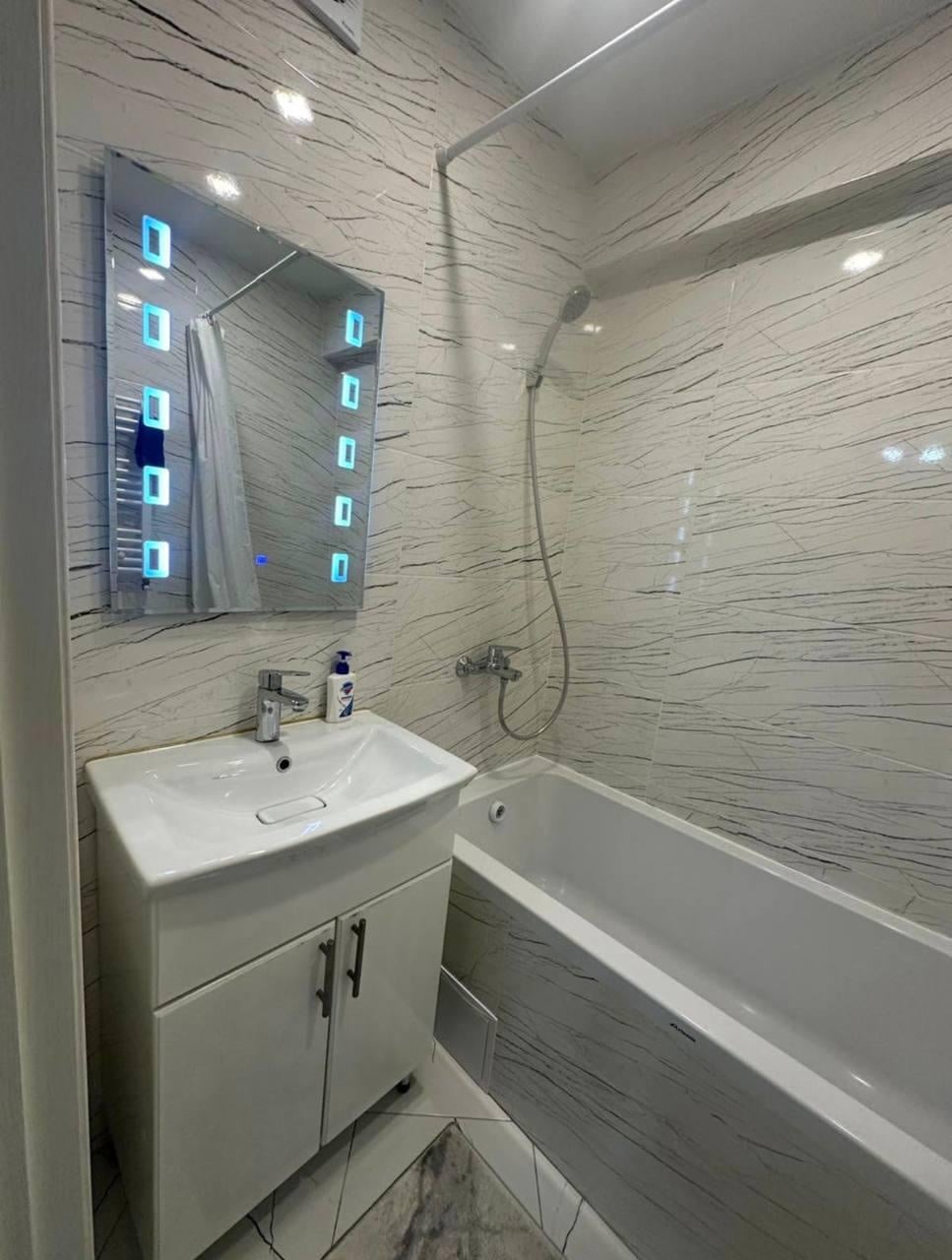 Bathroom tile and vanity from our renovation work