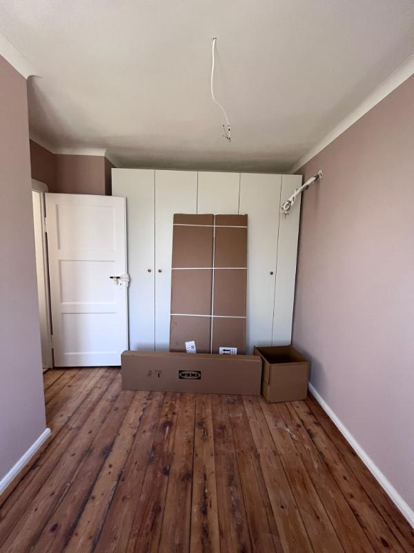 Rooms: paint and restored pine floors detail